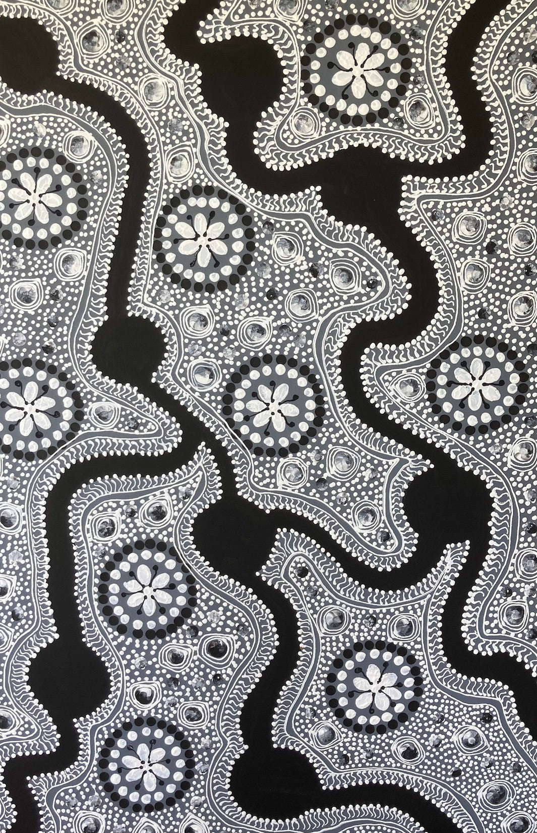 Black and white Aboriginal dot art and intricate lacing line art in Acrylic paint on canvas.