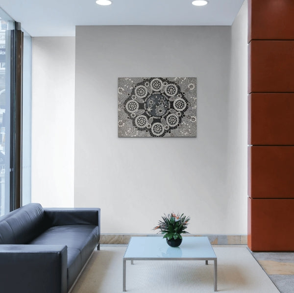 Mandala representation incorporation Aboriginal symbols and design in black and white dot art .