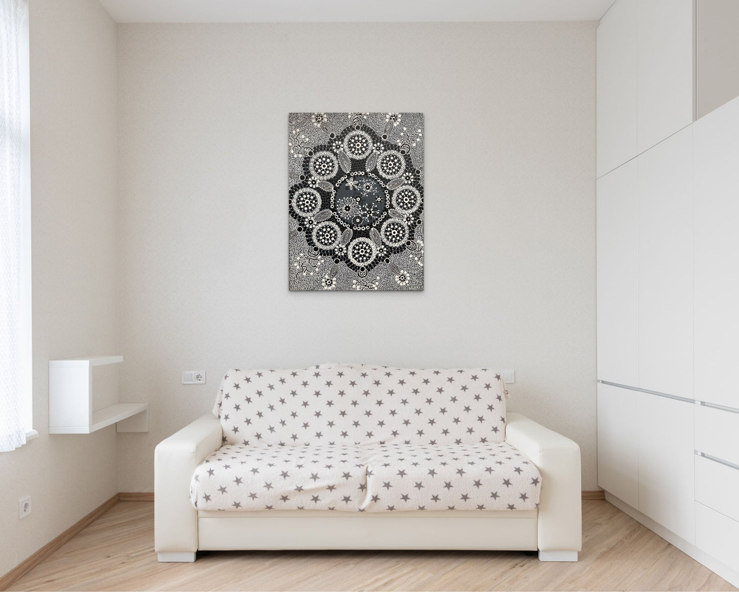 Mandala representation incorporation Aboriginal symbols and design in black and white dot art .