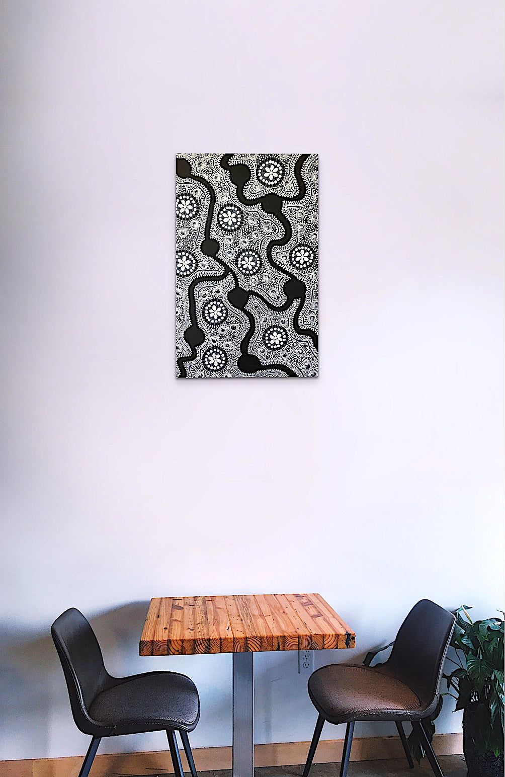 Black and white Aboriginal dot art and intricate lacing line art in Acrylic paint on canvas.